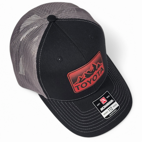 Toyota Mountains Laser Engraved Leatherette Patch Trucker Hat Black/Charcoal/Red