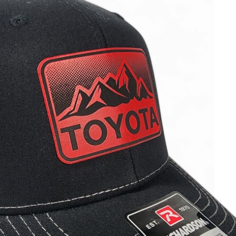 Toyota Mountains Laser Engraved Leatherette Patch Trucker Hat Black/Charcoal/Red