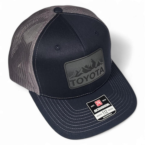 Navy / Charcoal Toyota Mountains Laser Engraved Vintage Style Leatherette Patch Trucker Richardson 112 Hat Cap