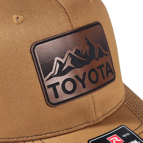 Caramel / Black Toyota Mountains Laser Engraved Vintage Style Leatherette Patch Trucker Richardson 112 Hat Cap