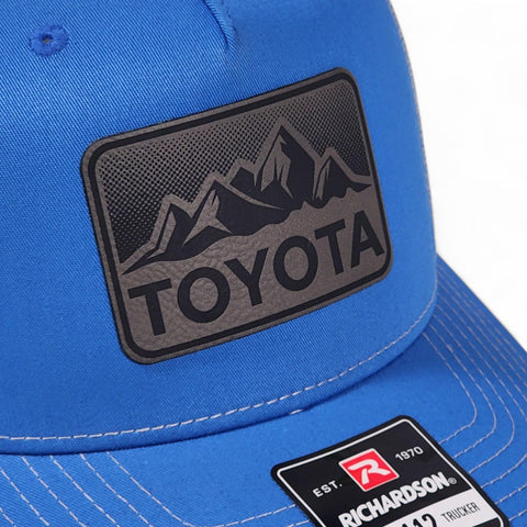 Cobalt Blue / Charcoal Toyota Mountains Laser Engraved Vintage Style Leatherette Patch Trucker Richardson 112 Hat Cap